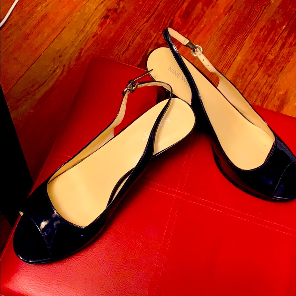 Open toe 2” strap shoe.